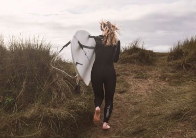 GUL women's wetsuit on the beach