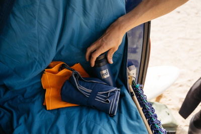 Red Equipment changing robe, adventure towel and insulated drinkware from the spring collection