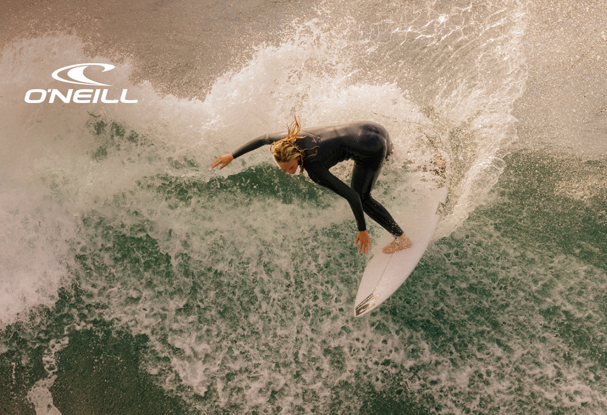 Man wearing an O'Neill wetsuit in the sea