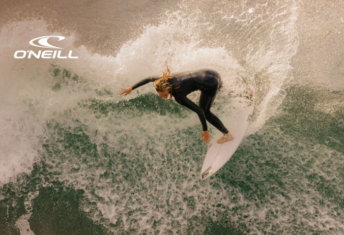 Man wearing an O'Neill wetsuit in the sea