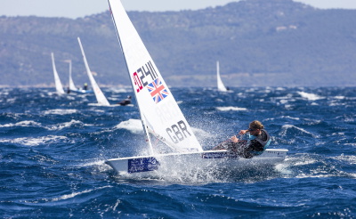Man sailing a Laser dinghy